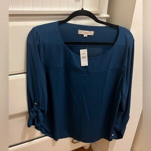 BRAND NEW WITH TAGS. Loft blue long sleeve. size L. never worn